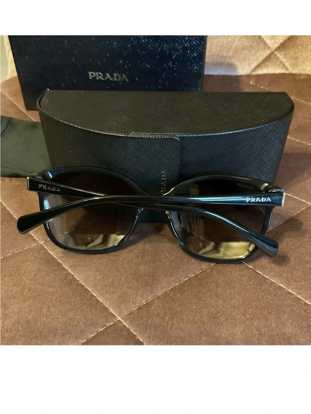 Prada Black Frame Sunglasses with Brown Gradient Lenses